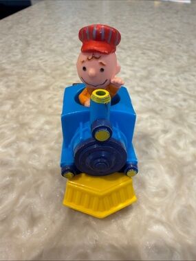 (5/$20) 1989 McDonald’s Peanuts Charlie Brown Conductor Toy